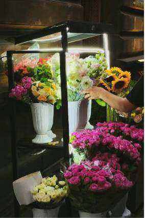 Table centrepieces curated for a reception